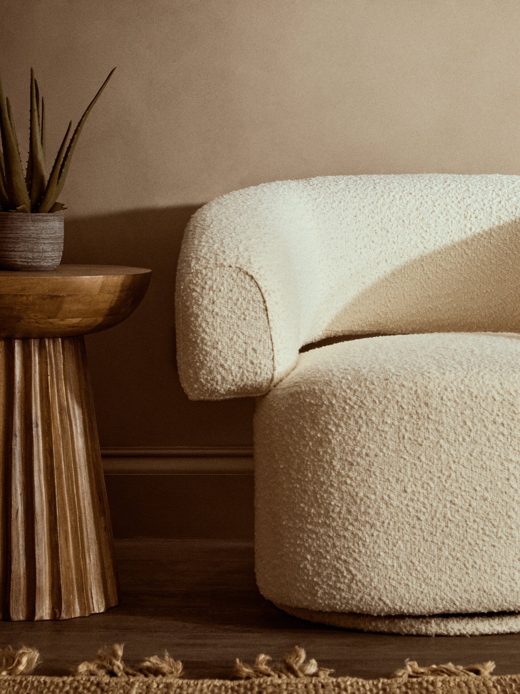 Oliveto Ivory Boucle Curved Swivel Armchair