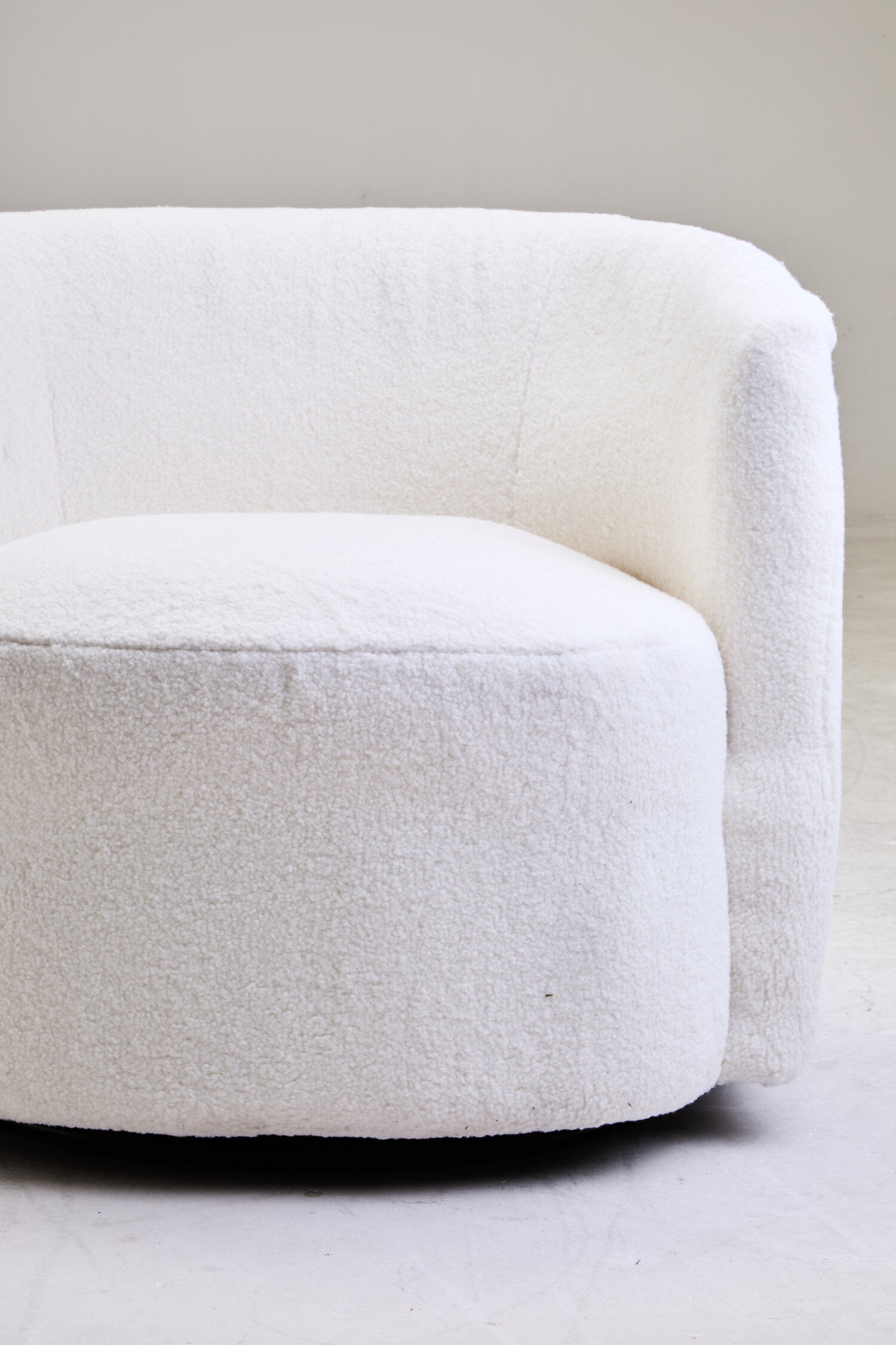 Montreal Ivory Boucle Effect Curved Lounge Chair With Swivel Base