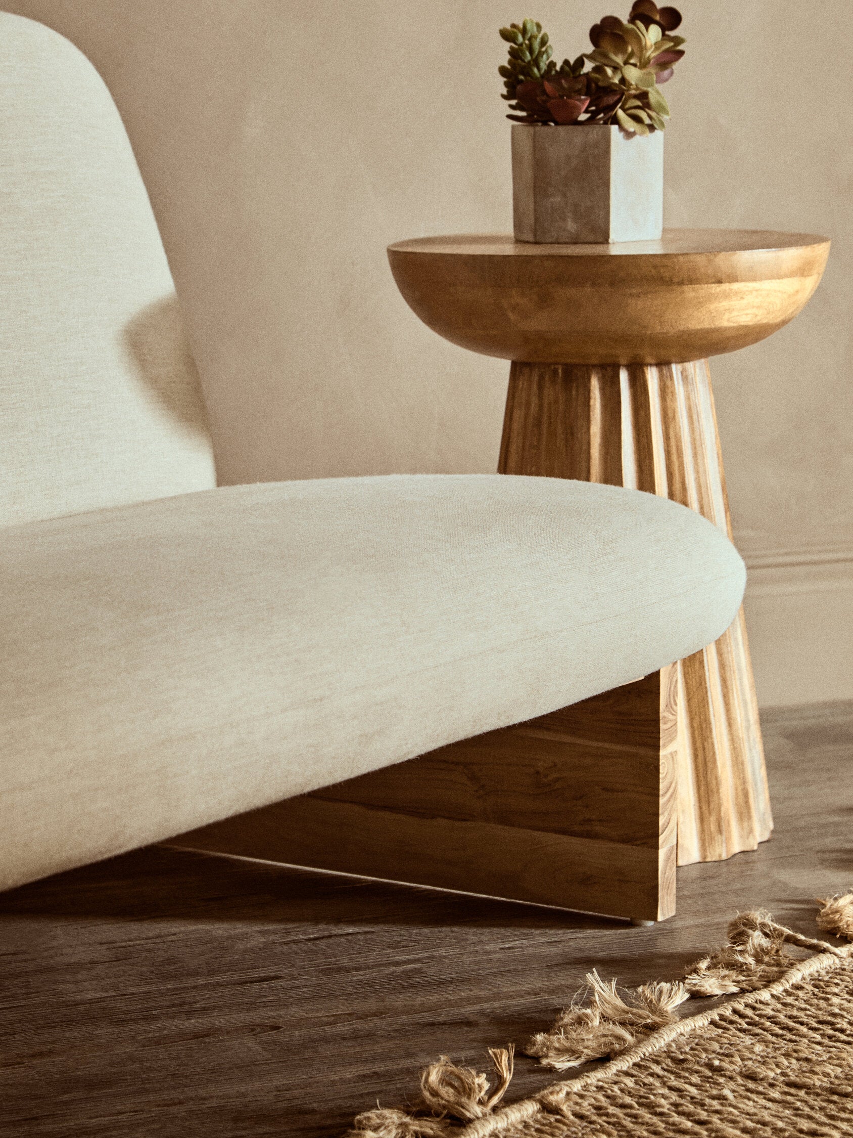 Parova Cream Linen Textured 2 Seater Armless Sofa With Wood Base