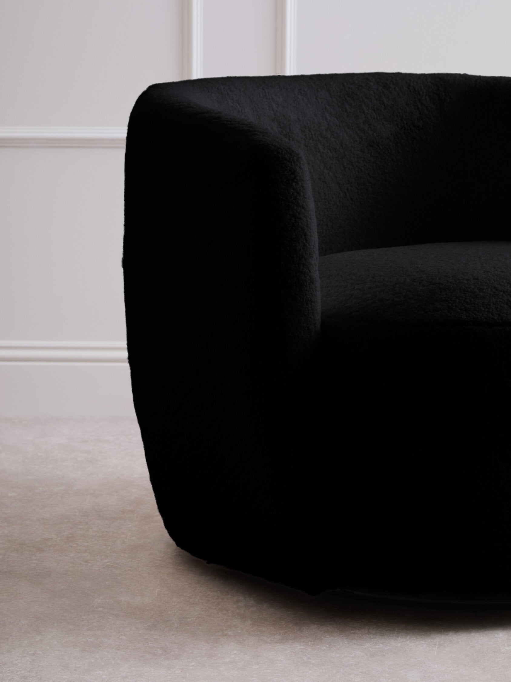 Montreal Black Boucle Effect Curved Lounge Chair With Swivel Base