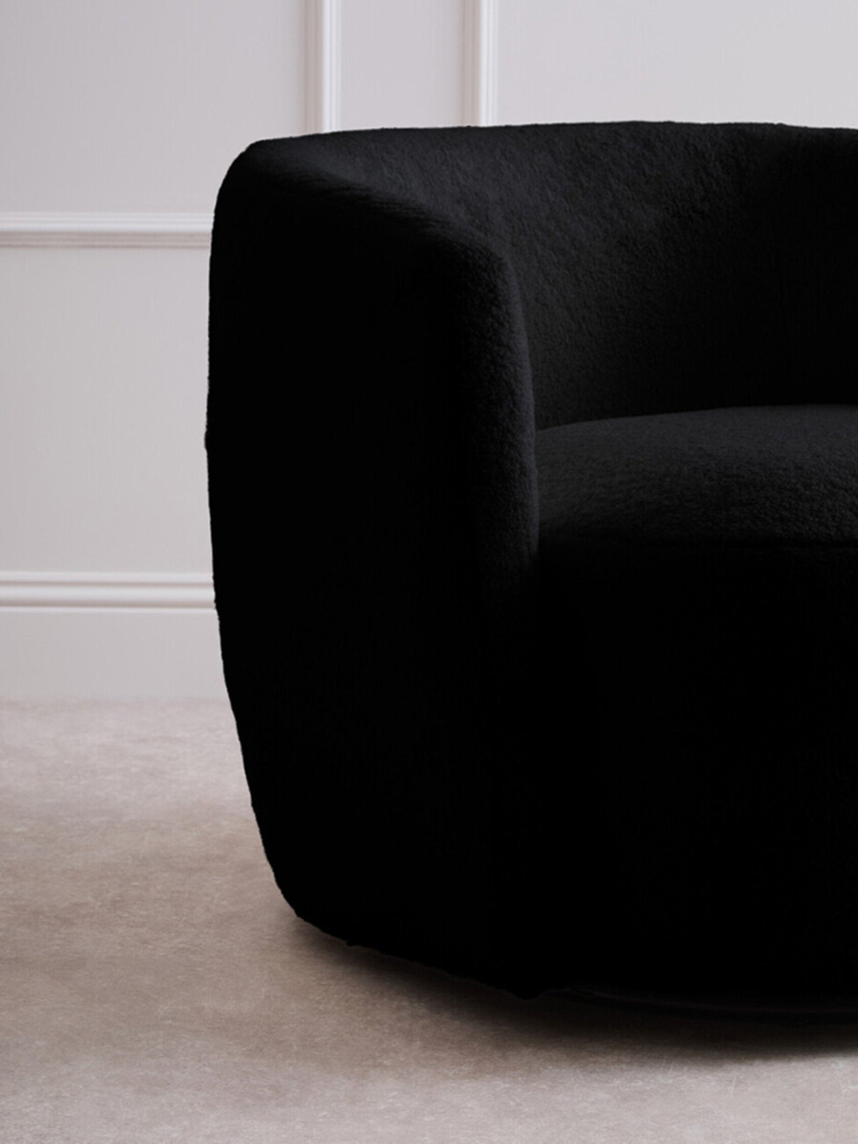 Montreal Black Boucle Effect Curved Lounge Chair With Swivel Base