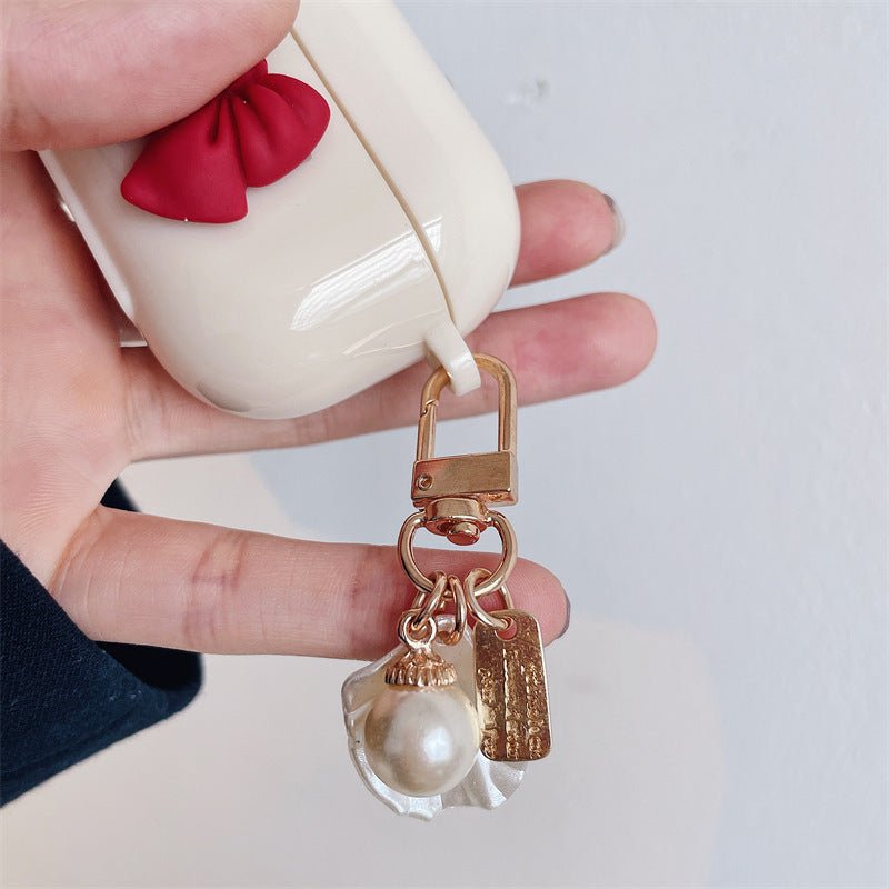 Beige Red Bow Shell Pendant Wireless Earphone Case | Luxury Home Accessories | Heulog Glow