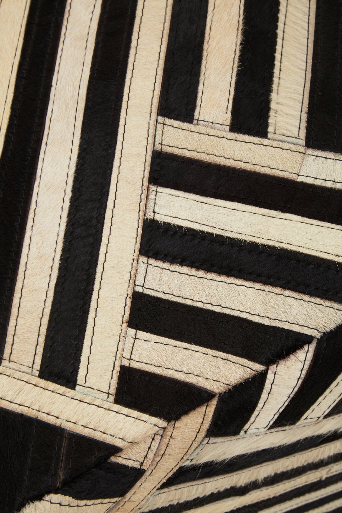Bosie Safira Black And White Stripe Leather Pouffe | Luxury Home Accessories | Heulog Glow