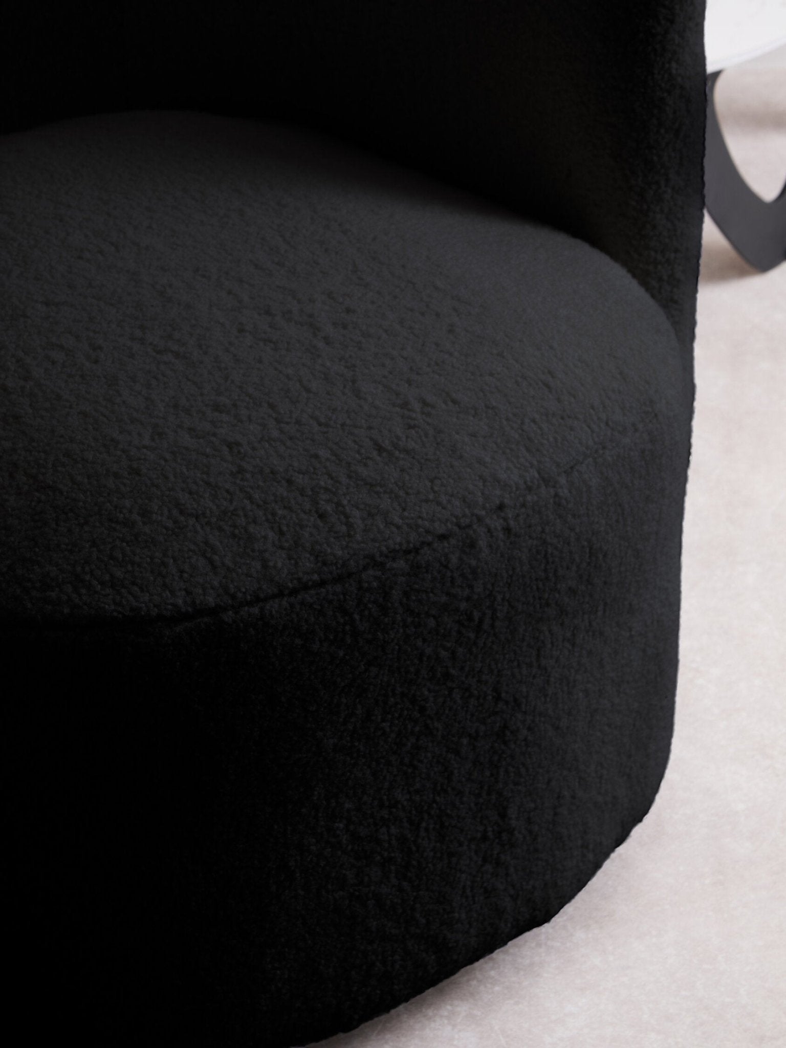 Montreal Black Boucle Effect Curved Lounge Chair With Swivel Base | Luxury Home Accessories | Heulog Glow