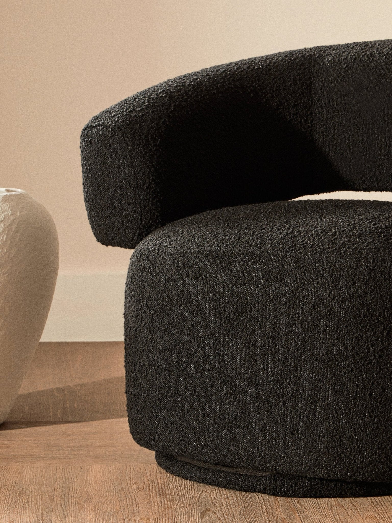 Oliveto Black Boucle Curved Swivel Armchair | Luxury Home Accessories | Heulog Glow