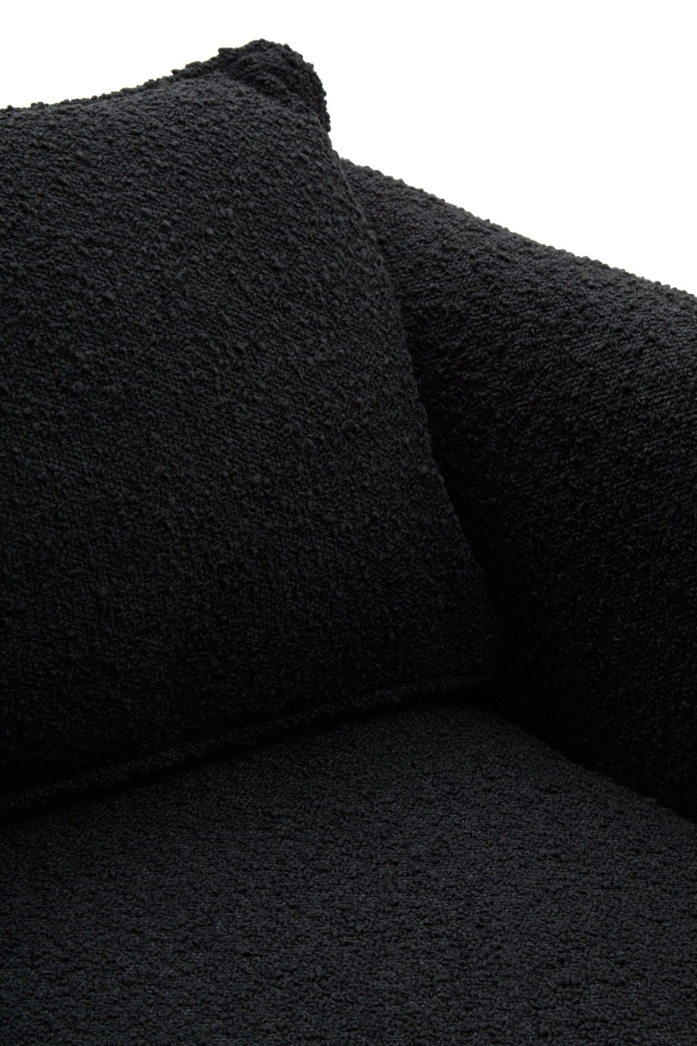 Ozzero Black Boucle Curved Armchair | Luxury Home Accessories | Heulog Glow