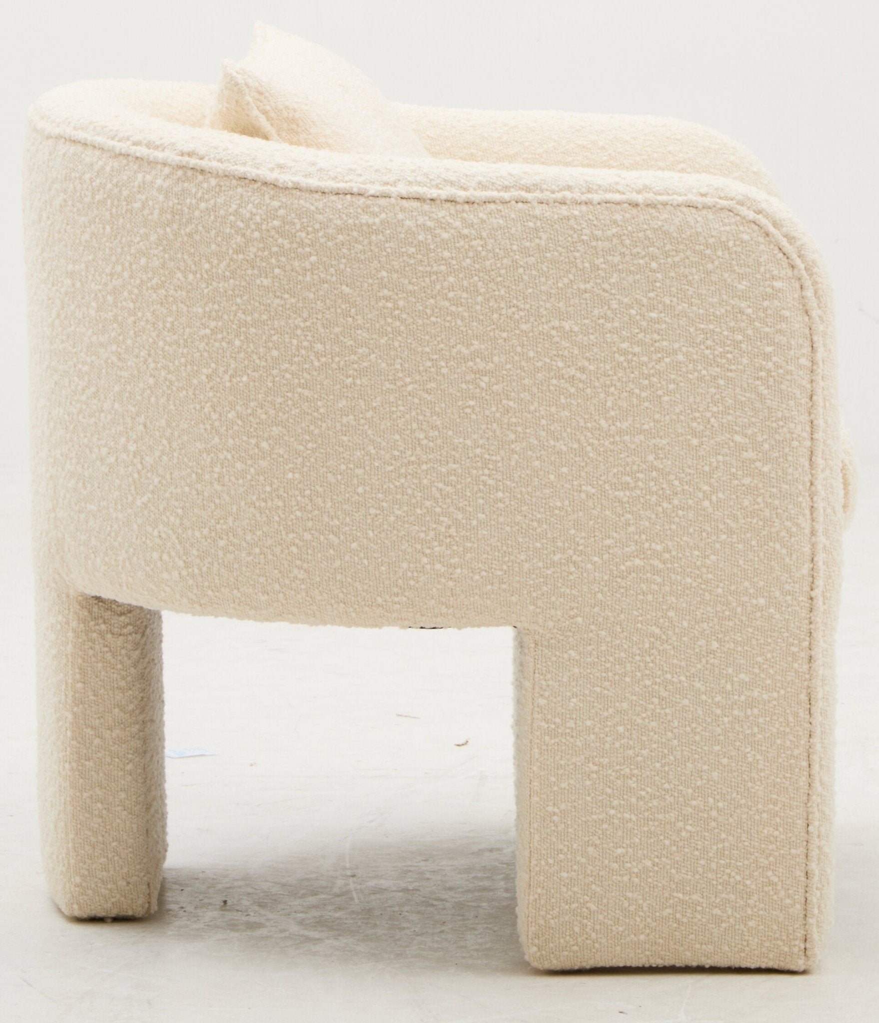 Ozzero Ivory Boucle Curved Armchair | Luxury Home Accessories | Heulog Glow