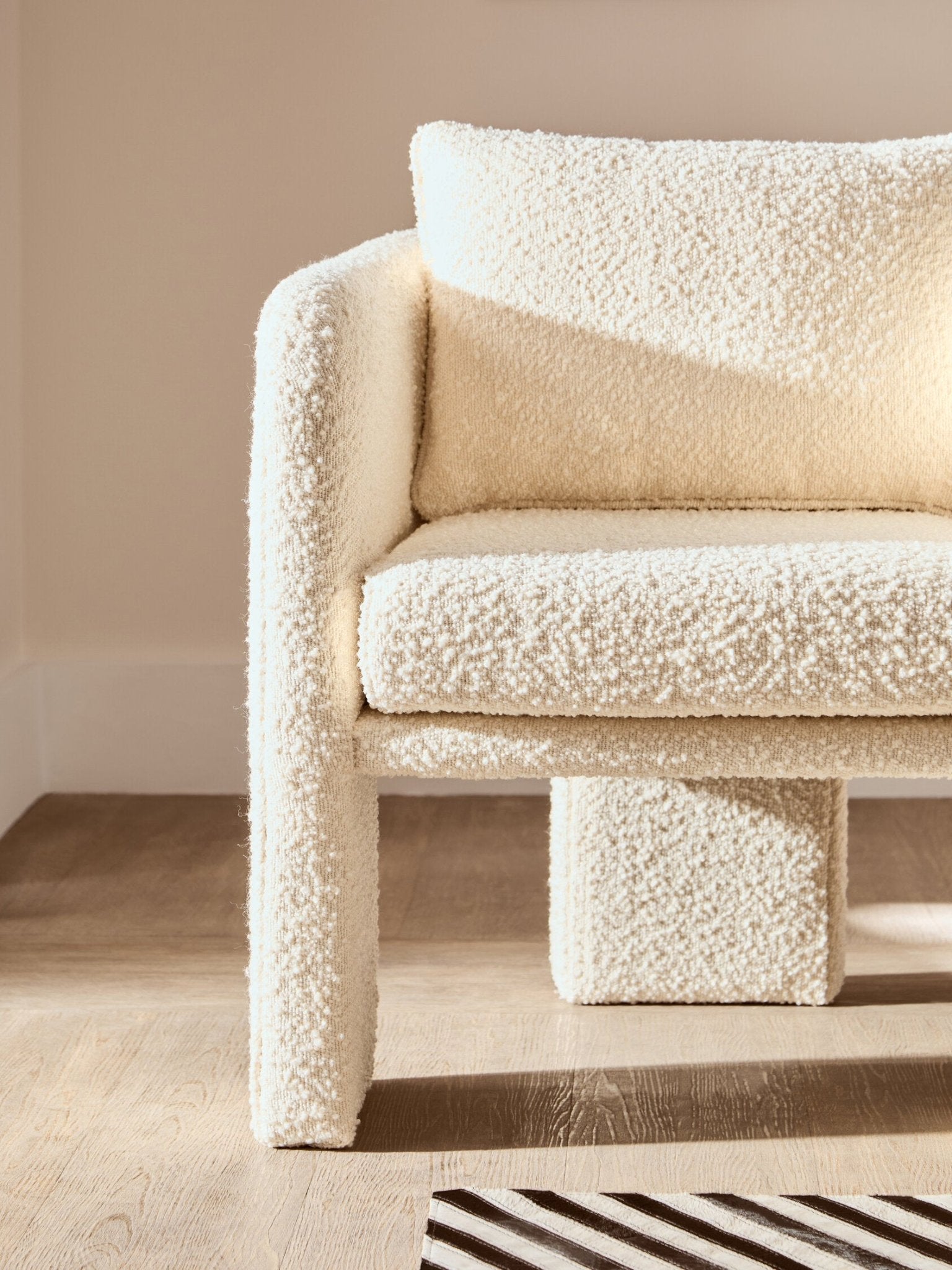 Ozzero Ivory Boucle Curved Armchair | Luxury Home Accessories | Heulog Glow