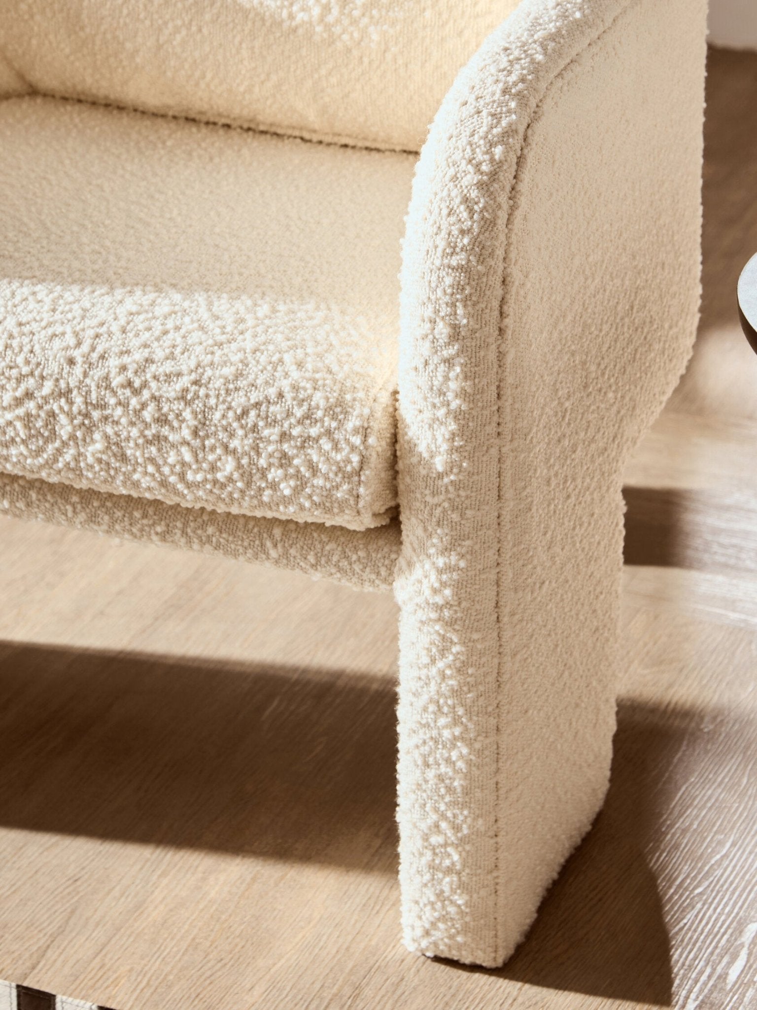 Ozzero Ivory Boucle Curved Armchair | Luxury Home Accessories | Heulog Glow