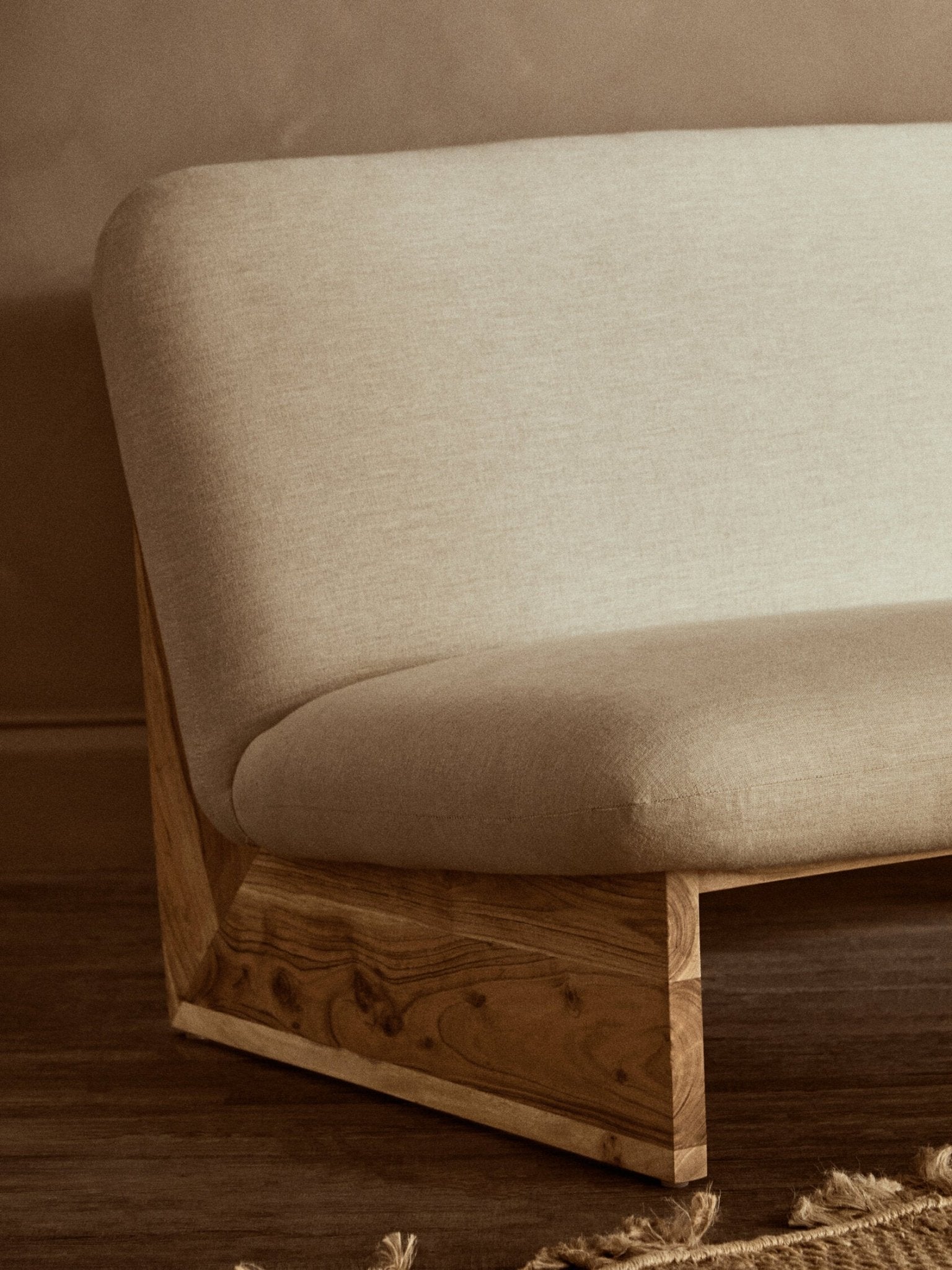 Parova Cream Linen Textured 2 Seater Armless Sofa With Wood Base | Luxury Home Accessories | Heulog Glow